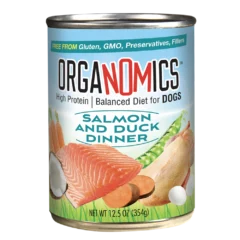 A can of OrgaNOMics Salmon and Duck Dinner for Dogs, featuring images of salmon, duck, peas, and coconut on the label, and emphasizing "High Protein" as well as being "Free from Gluten, GMO, and Preservatives.