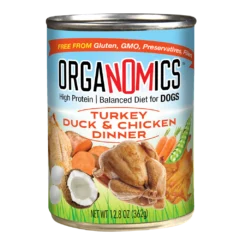 A can from the OrgaNOMics Turkey Duck & Chicken Dinner for Dogs - 12, 12.5 oz cans set, featuring images of cooked poultry, vegetables, and coconut on the label along with detailed product information.